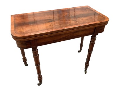 Lot 1336 - Regency rosewood and brass inlaid card table