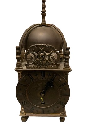 Lot 596 - 17th century style brass lantern clock