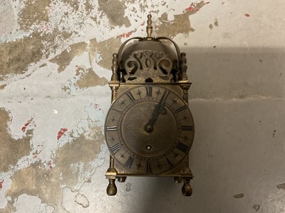 Lot 596 - 17th century style brass lantern clock