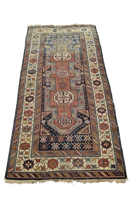 Lot 1425 - Kazak rug with five conjoined medallions