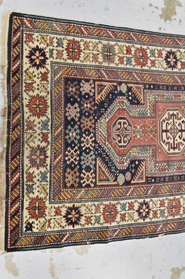 Lot 1425 - Kazak rug with five conjoined medallions