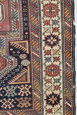 Lot 1425 - Kazak rug with five conjoined medallions