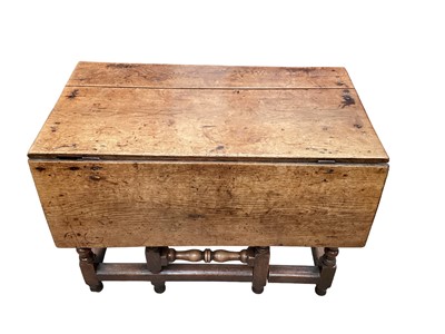 Lot 1514 - Early 18th century honey oak drop leaf table on turned and block understructure.  3.3ft wide x 3ft deep. Provenance:  Ormsby-Gore family.