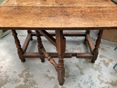 Lot 1514 - Early 18th century honey oak drop leaf table on turned and block understructure.  3.3ft wide x 3ft deep. Provenance:  Ormsby-Gore family.