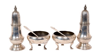 Lot 330 - Tiffany & Co. American silver salts and matching spoons with a pair of silver casters