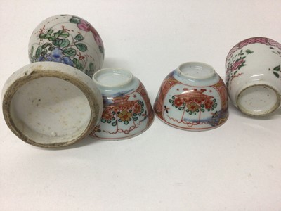 Lot 5 - 18th century Chinese Batavian ware famille rose vase, of baluster form on splayed base, together with a famille rose cup and two clobbered tea bowls (4)