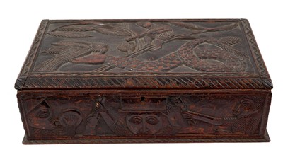 Lot 829 - Late 19th/early 20th century African tribal relief carved box, carved to each face with hunting scenes, 36cm wide