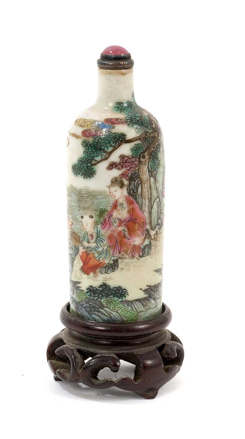 Lot 830 - Good quality 19th century Chinese enamelled porcelain snuff bottle, decorated with continuous frieze, 8cm high, seal mark to the base, raised on pierced wooden stand