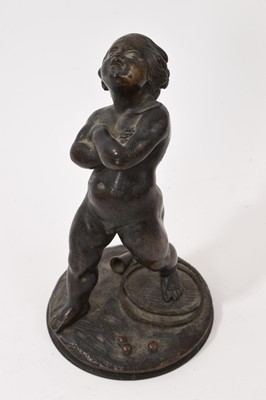 Lot 831 - 19th century continental bronze figure of a putto, 14cm high