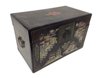 Lot 839 - Chinese papier mâché trunk, with flanking carrying handles, decorated with landscape reserves, 43cm wide