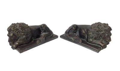 Lot 885 - Pair of bronzed terracotta recumbent lions