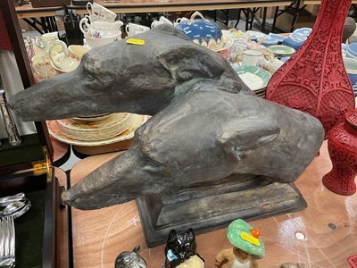 Lot 421 - Bronzed terracotta greyhound heads