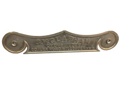 Lot 117 - Vintage cast metal sign- 'S.W. Clapham Oven builder, 20 Ilex Road, Willesden, NW10', 133.5cm in length.