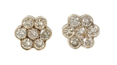 Lot 534 - Pair of diamond flower head cluster earrings