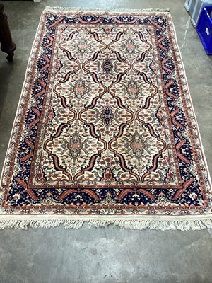 Lot 1376 - Eastern rug with geometric decoration on beige, blue and red ground