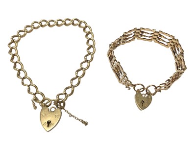 Lot 84 - 9ct gold curb link bracelet and 9ct gold gate bracelet both with padlock clasps (2)