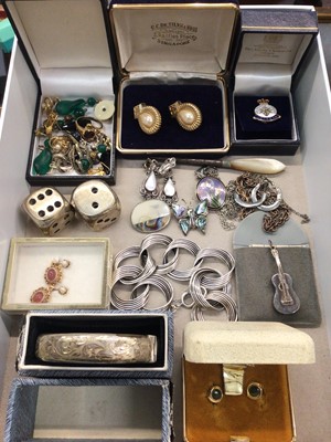 Lot 1024 - 1950s silver bangle, silver circular link bracelet, other silver jewellery, pair of Givenchy gilt metal and simulated pearl earrings and a pair of plated dice