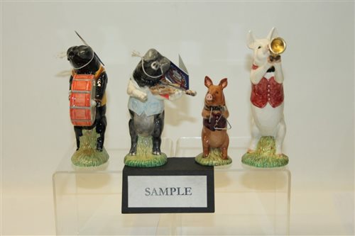 Lot 2067 - Nine piece Beswick pig band comprising Matthew,...