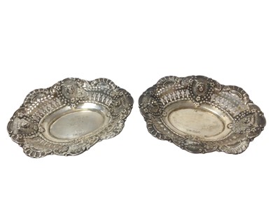 Lot 266 - Pair of Edwardian silver bonbon dishes with lion mask decoration (Sheffield 1908)