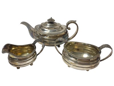 Lot 269 - George III silver three piece teaset