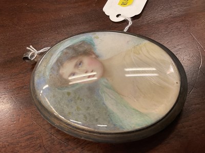 Lot 909 - Mabel Lee Hankey née Hobson (1867-1943): portrait miniature on ivory, depicting a young woman with green hat