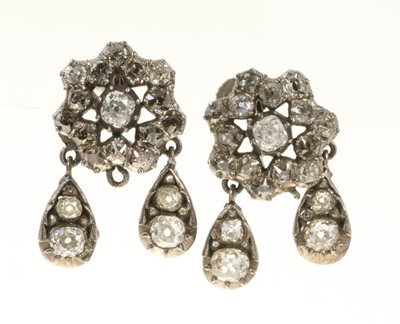 Lot 442 - Pair of antique diamond cluster pendant earrings set with old cut diamonds