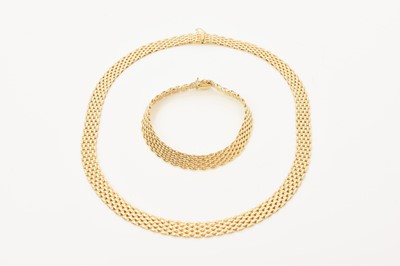 Lot 690 - Italian 18ct gold seven row brick link necklace and matching bracelet