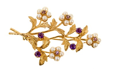 Lot 513 - 9ct gold amethyst and seed pearl floral spray brooch