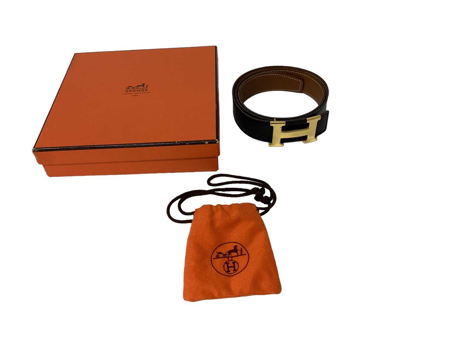 Lot 2061 - Hermès reversible Swift calfskin and Epsom calfskin leather belt, in black and brown, with a gilt metal 'H' buckle stamped - Hermes, in original box