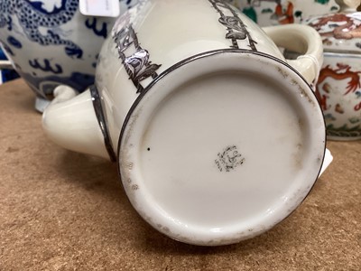 Lot 66 - Continental porcelain coffee set overlaid in sterling silver foliate scroll panels