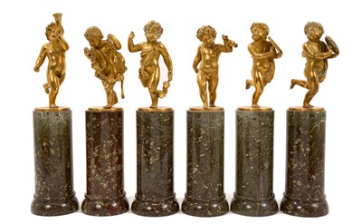 Lot 919 - Set of six 19th century ormolu cherubs, emblematic of music and merriment. on marble columns