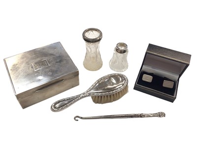 Lot 1025 - Silver cigarette box, pair of silver cufflinks, silver rimmed glass perfume bottle and posy vase, silver handled button hook and a white metal mounted miniature brush