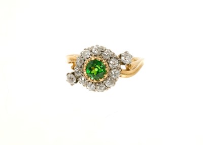 Lot 686 - Late Victorian green garnet and diamond cluster ring