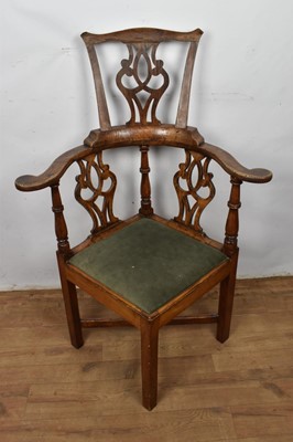 Lot 1259 - George III high backed elm corner chair, with pierced splat and slip in seat on internally chamfered square supports