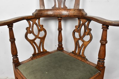 Lot 1259 - George III high backed elm corner chair, with pierced splat and slip in seat on internally chamfered square supports