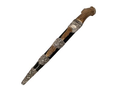 Lot 908 - Fine Victorian Scottish silver mounted dirk with stag horn grips set with semi precious stones.