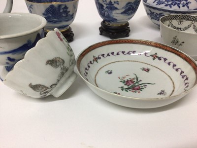 Lot 58 - Group of 18th century Chinese porcelain, including a pair of blue and white tea bowls on stands, a pair of rice bowls and covers, a blue and white cream jug, two grisaille tea bowls, a blue and whi...