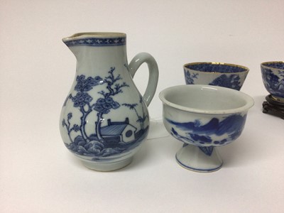Lot 58 - Group of 18th century Chinese porcelain, including a pair of blue and white tea bowls on stands, a pair of rice bowls and covers, a blue and white cream jug, two grisaille tea bowls, a blue and whi...