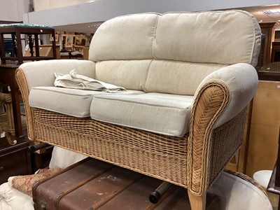 Lot 1244 - Wicker conservatory set comprising of a two seater sofa, two armchairs and a glass topped table