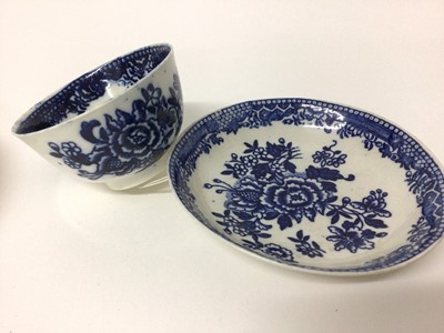 Lot 67 - Three 18th century Liverpool tea bowls and saucers, including one decorated in polychrome enamels with Chinese figures, one with fruit and another with flowers