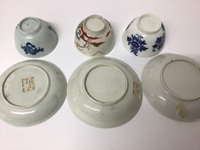 Lot 67 - Three 18th century Liverpool tea bowls and saucers, including one decorated in polychrome enamels with Chinese figures, one with fruit and another with flowers