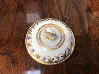 Lot 71 - Crown Derby custard cup and cover, circa 1790, with foliate pattern in enamels and gilt, and a Crown Derby fluted tea bowl and saucer, all with puce marks (3)
