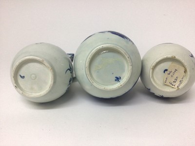 Lot 72 - Three 18th century Worcester blue and white printed sparrow beak jugs, one with the Fisherman and Cormorant pattern, one Mansfield pattern, and the other in the Three Flowers pattern, the largest 1...