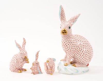 Lot 76 - Set of four Herend porcelain models of rabbits, the largest 30.5cm high