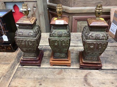 Lot 23 - Three Chinese bronze table lamps