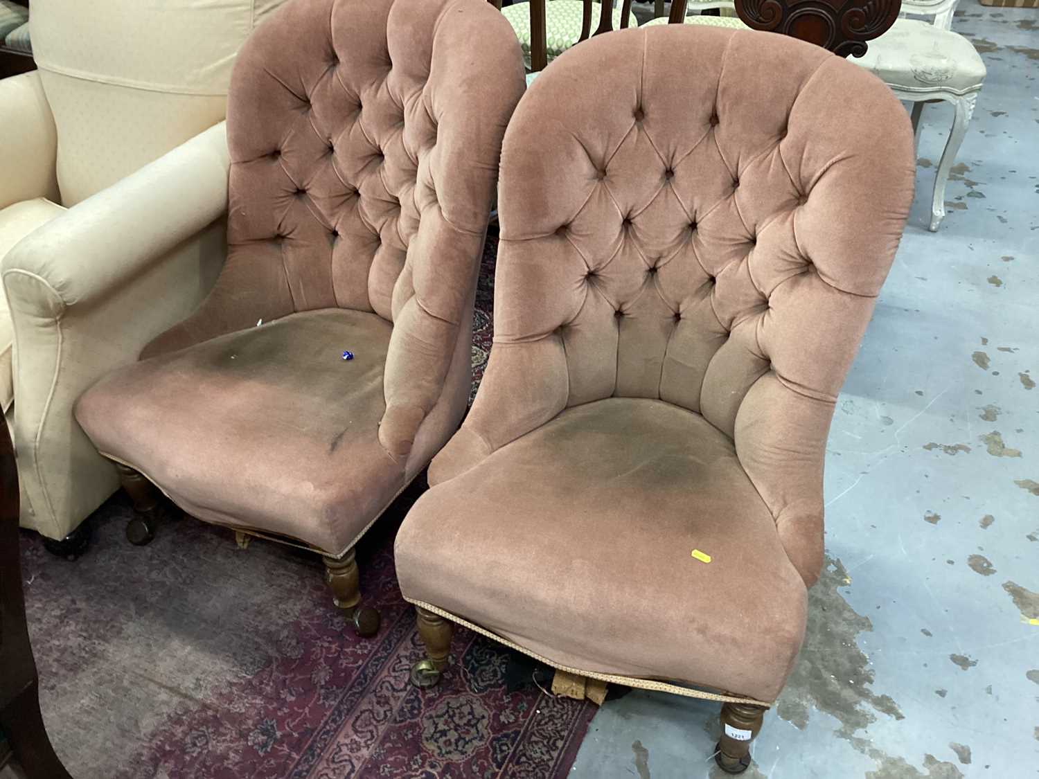 Lot 1221 - Two Victorian nursing chairs with buttoned velvet upholstery