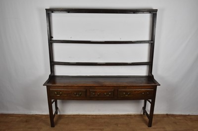 Lot 1361 - George III two height oak dresser