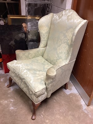 Lot 1295 - Georgian-style wing chair with green upholstery on cabriole front legs