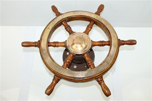 Lot 2094 - Old brass mounted wooden ships' wheel, faintly...