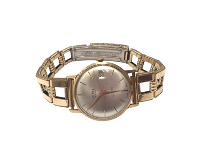 Lot 37 - 1960s Trebex 9ct gold cased calendar wristwatch on a gold plated bracelet